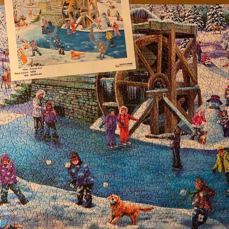 Puzzle of kids skating on frozen river