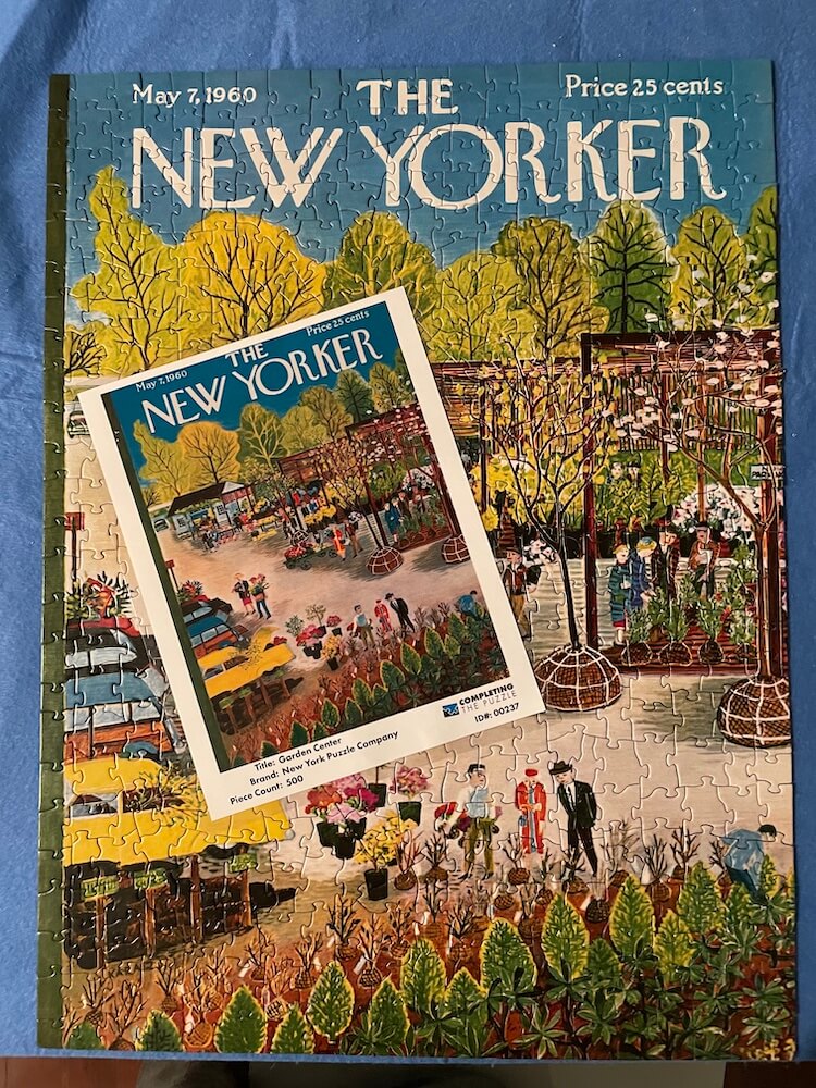 Puzzle of a New Yorker magazine cover with a gaden center of trees and lowers with people walking through it