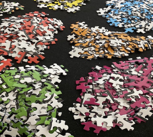 Jigsaw Puzzle Tips: Pieces in piles by color