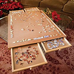 Puzzle board with drawers out and puzzle piece on it.